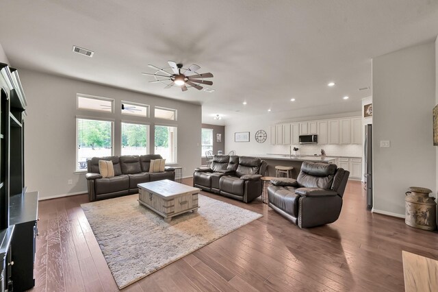 9175 White Tail Dr, Conroe, TX 77303 - living room featuring recessed lighting, a ceiling fan, dark wood-style flooring, and baseboards
