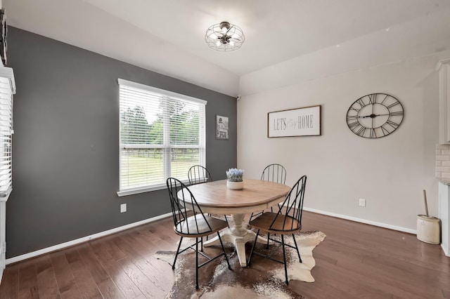 9175 White Tail Dr, Conroe, TX 77303 - dining room with dark wood-style flooring and baseboards