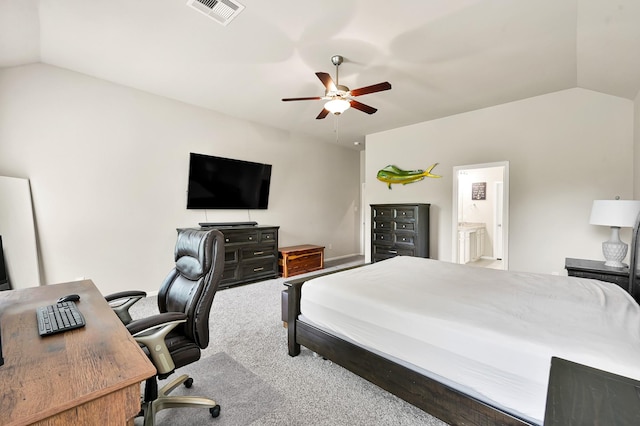 9175 White Tail Dr, Conroe, TX 77303 - carpeted bedroom featuring lofted ceiling, a desk, ceiling fan, and ensuite bathroom