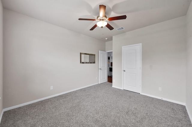 9175 White Tail Dr, Conroe, TX 77303 - unfurnished bedroom with carpet floors, baseboards, and ceiling fan
