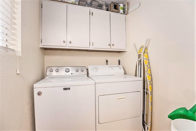 1500 Bay Area Blvd Unit 424, Houston, TX 77058 - laundry room with washer and dryer and cabinet space
