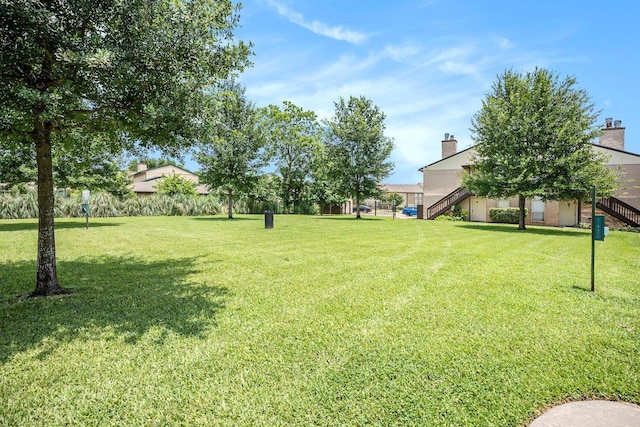 1500 Bay Area Blvd Unit 424, Houston, TX 77058 - view of grassy yard featuring stairway