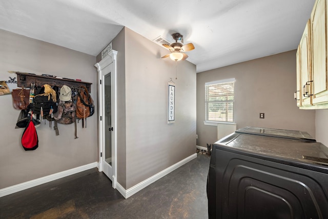 424 Hankamer Loop, Hankamer, TX 77560 - laundry area featuring cabinet space, baseboards, a ceiling fan, and separate washer and dryer