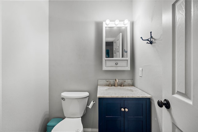 424 Hankamer Loop, Hankamer, TX 77560 - bathroom featuring vanity and toilet