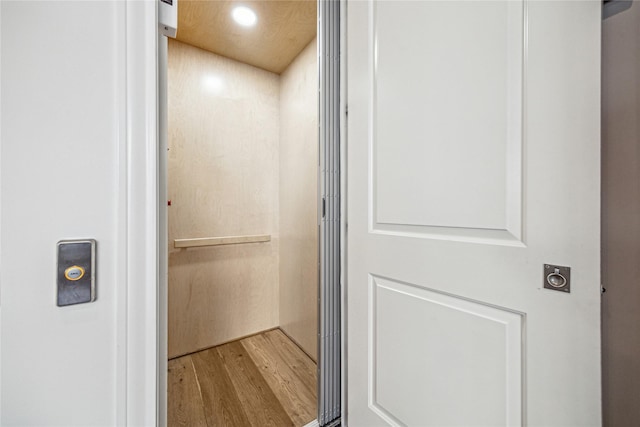 7506 Little Caprese Ln, Houston, TX 77055 - elevator featuring wood finished floors and recessed lighting