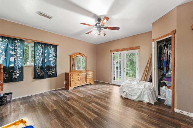560 Donahoe Rd, Coldspring, TX 77331 - bedroom with wood finished floors, access to outside, ceiling fan, and baseboards