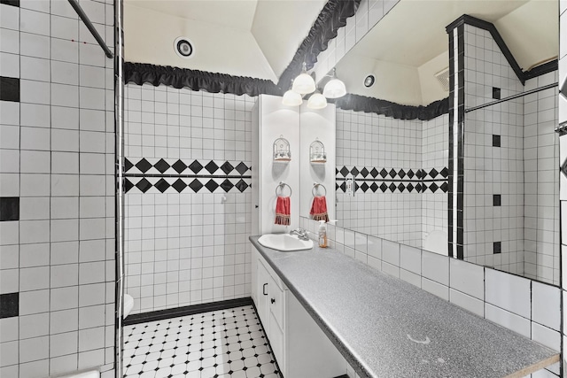 560 Donahoe Rd, Coldspring, TX 77331 - bathroom featuring vanity, toilet, tiled shower, and tile patterned flooring