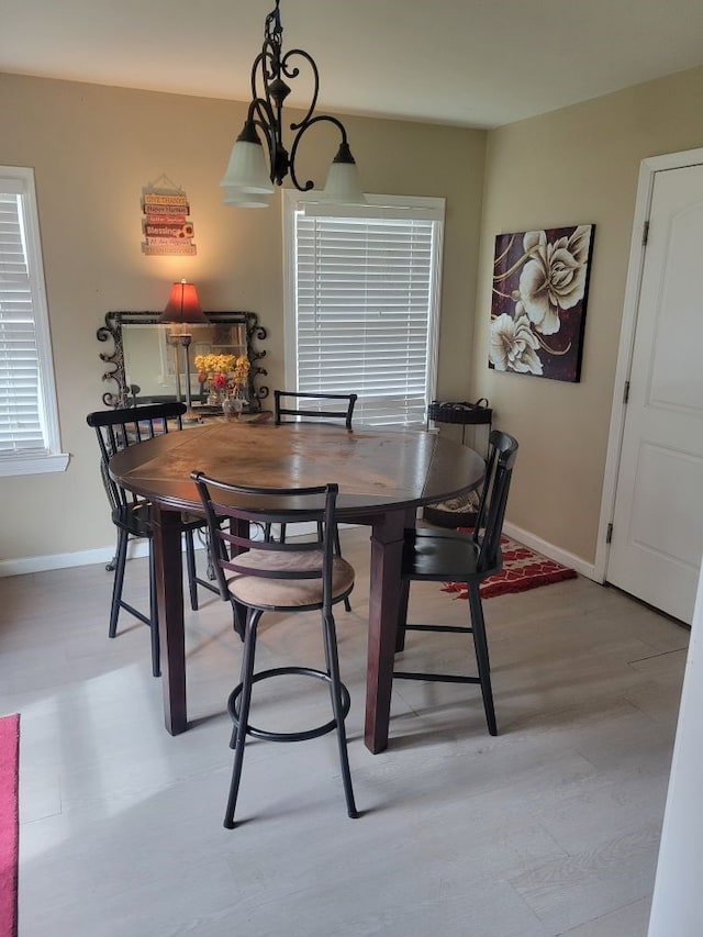 118 Whiting St, Galveston, TX 77550 - dining space with baseboards and light wood-style flooring