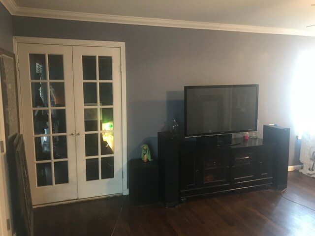 118 Whiting St, Galveston, TX 77550 - living room with french doors, dark wood-style floors, and ornamental molding