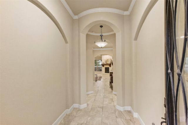 31428 Longwood Park Ln, Spring, TX 77386 - hallway featuring arched walkways, crown molding, and baseboards