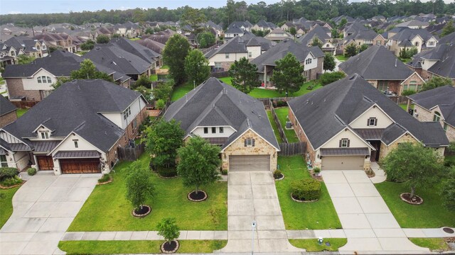31428 Longwood Park Ln, Spring, TX 77386 - aerial perspective of suburban area