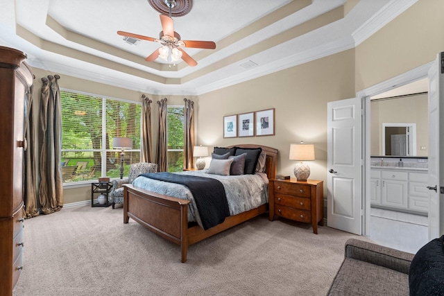 3 Forest Steppes Ct, The Woodlands, TX 77382 - bedroom featuring light colored carpet, a raised ceiling, ornamental molding, ensuite bathroom, and ceiling fan