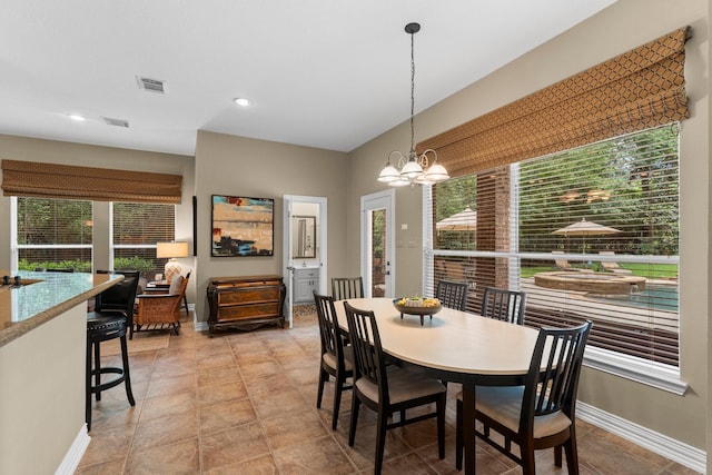 3 Forest Steppes Ct, The Woodlands, TX 77382 - dining space featuring a chandelier, plenty of natural light, baseboards, and recessed lighting