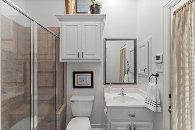3 Forest Steppes Ct, The Woodlands, TX 77382 - full bath with vanity, a shower stall, and toilet