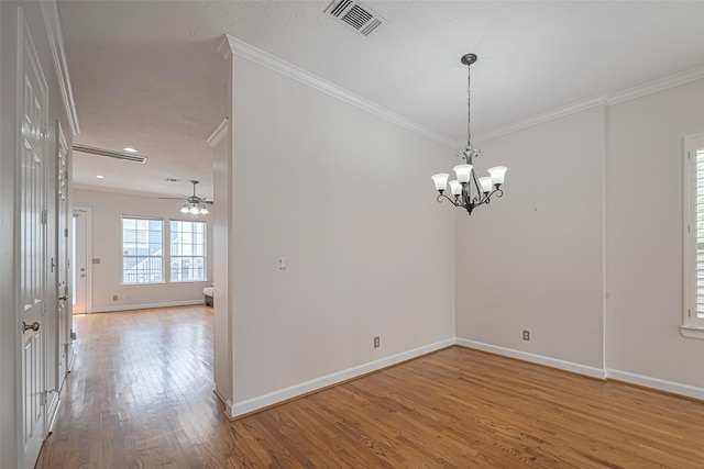1108 W 22nd St, Houston, TX 77008 - spare room featuring ornamental molding, light wood-style flooring, baseboards, a chandelier, and a ceiling fan