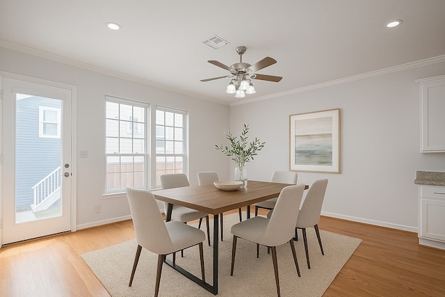 1108 W 22nd St, Houston, TX 77008 - dining space featuring light wood-style flooring, ornamental molding, baseboards, a ceiling fan, and recessed lighting