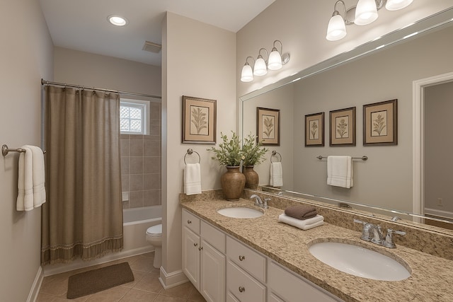 1108 W 22nd St, Houston, TX 77008 - full bath with double vanity, tile patterned floors, shower / tub combo, toilet, and baseboards