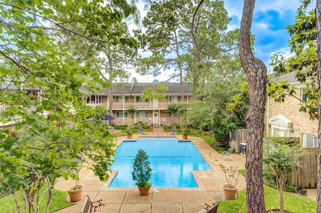 4040 San Felipe St Unit 203, Houston, TX 77027 - community pool with a patio area