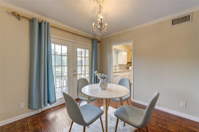 4040 San Felipe St Unit 203, Houston, TX 77027 - dining space with a chandelier, french doors, baseboards, hardwood / wood-style flooring, and ornamental molding