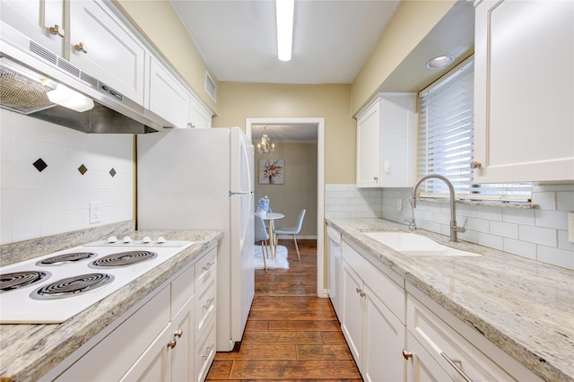 4040 San Felipe St Unit 203, Houston, TX 77027 - kitchen with under cabinet range hood, a sink, white appliances, tasteful backsplash, and white cabinets