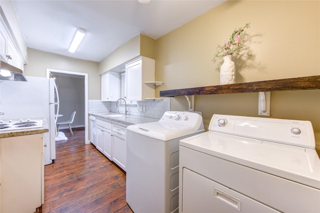 4040 San Felipe St Unit 203, Houston, TX 77027 - laundry room with dark wood-style floors and washer and dryer