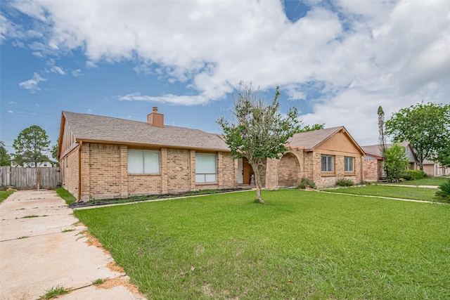 19531 Lazy Valley Dr, Katy, TX 77449 - single story home with brick siding, a chimney, and roof with shingles