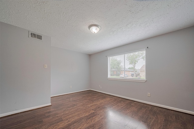 19531 Lazy Valley Dr, Katy, TX 77449 - unfurnished room with wood finished floors, a textured ceiling, and baseboards