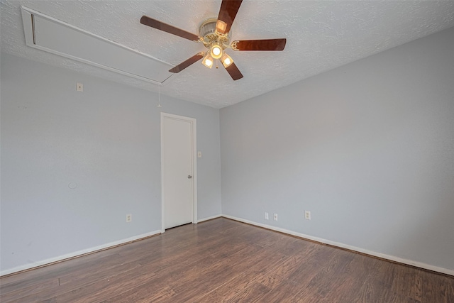 19531 Lazy Valley Dr, Katy, TX 77449 - empty room with attic access, wood finished floors, a ceiling fan, baseboards, and a textured ceiling