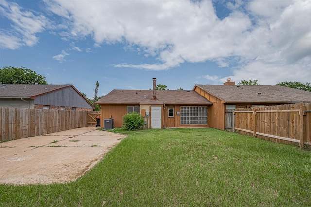 19531 Lazy Valley Dr, Katy, TX 77449 - back of house with central AC unit and a patio area