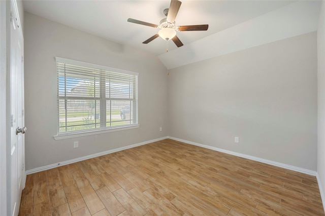 3677 Pinewood Bend Ln, Spring, TX 77386 - empty room with a ceiling fan, light wood-type flooring, baseboards, and vaulted ceiling