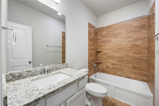 3677 Pinewood Bend Ln, Spring, TX 77386 - bathroom featuring toilet, vanity, shower / washtub combination, and wood finished floors