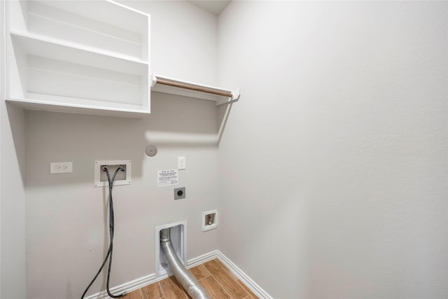 3677 Pinewood Bend Ln, Spring, TX 77386 - washroom featuring electric dryer hookup, gas dryer hookup, washer hookup, light wood-type flooring, and baseboards