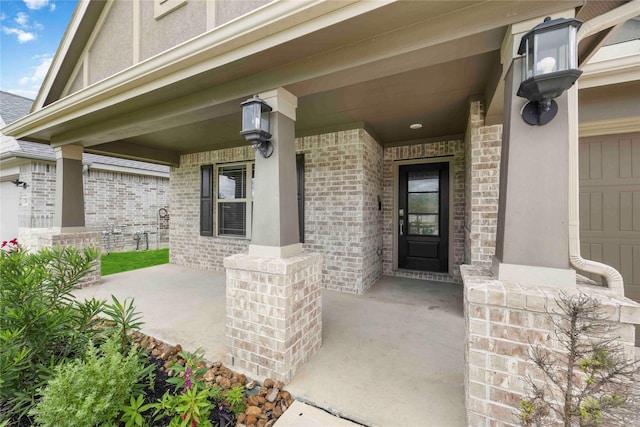 3677 Pinewood Bend Ln, Spring, TX 77386 - view of exterior entry with covered porch and brick siding