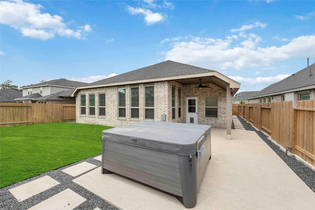 3677 Pinewood Bend Ln, Spring, TX 77386 - rear view of house with a hot tub, a ceiling fan, a patio, and brick siding