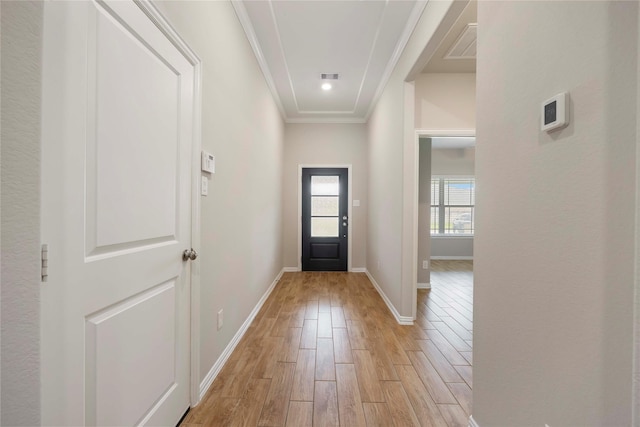 3677 Pinewood Bend Ln, Spring, TX 77386 - entryway featuring light wood-style flooring, baseboards, and ornamental molding