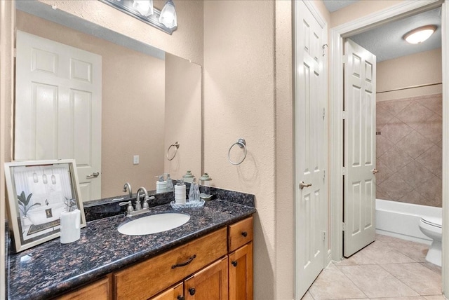 3707 Charleston St, Houston, TX 77021 - bathroom with vanity, tile patterned floors, toilet, and tub / shower combination