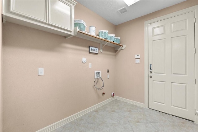 3707 Charleston St, Houston, TX 77021 - laundry area with hookup for a gas dryer, cabinet space, hookup for an electric dryer, baseboards, and hookup for a washing machine