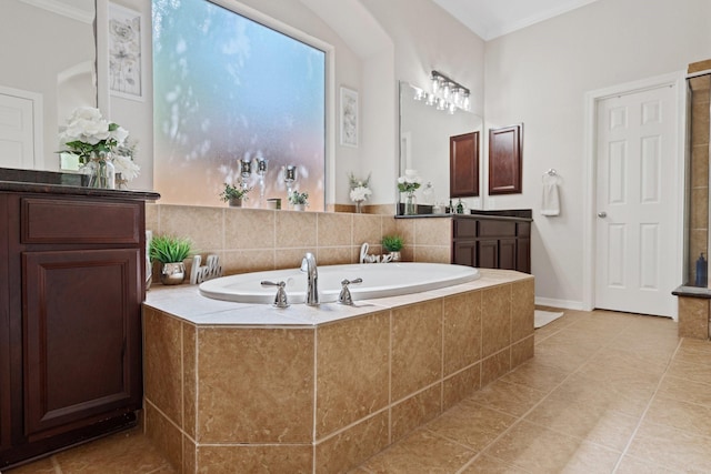 2153 Summit Mist Dr, Conroe, TX 77304 - bathroom featuring a bath, crown molding, vanity, tile patterned flooring, and baseboards