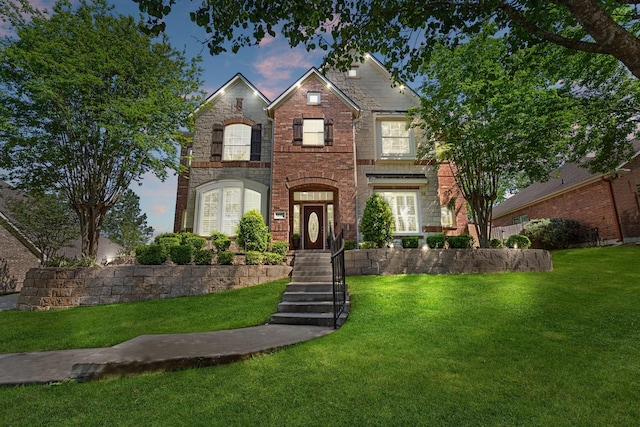 2153 Summit Mist Dr, Conroe, TX 77304 - view of front of house featuring a front lawn, brick siding, and stone siding