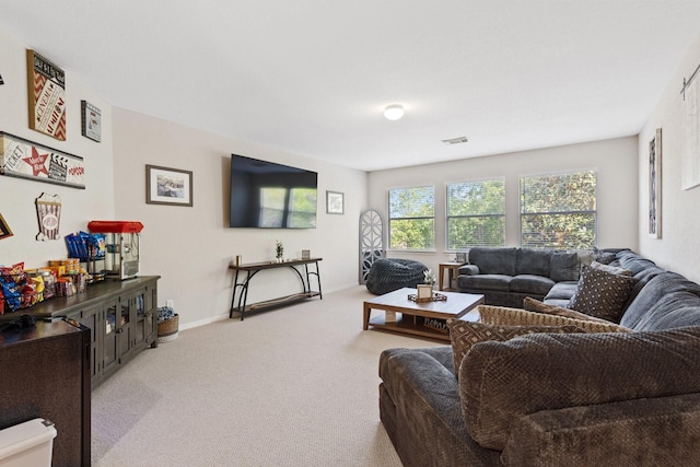 2153 Summit Mist Dr, Conroe, TX 77304 - living room with carpet flooring and baseboards