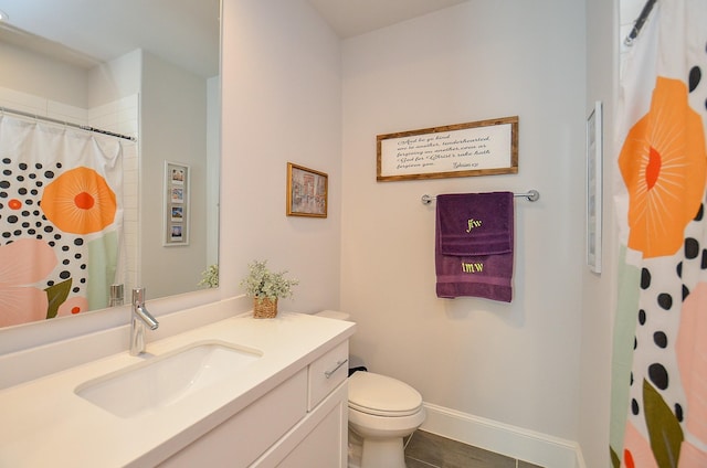 2419 W Kolbe Ln, Houston, TX 77080 - bathroom featuring toilet, vanity, tile patterned floors, baseboards, and a shower with shower curtain