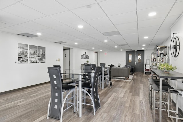 2016 Main St Unit 1502, Houston, TX 77002 - dining room featuring wood finished floors, recessed lighting, and baseboards