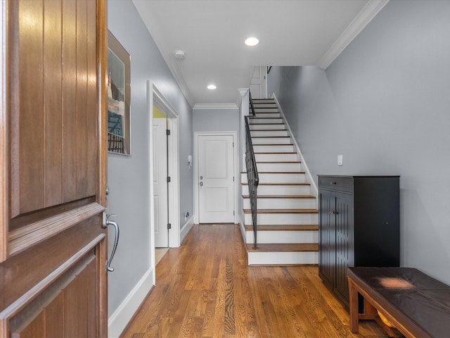 1616 Rosewood St, Houston, TX 77004 - foyer entrance with ornamental molding, stairs, wood finished floors, and recessed lighting
