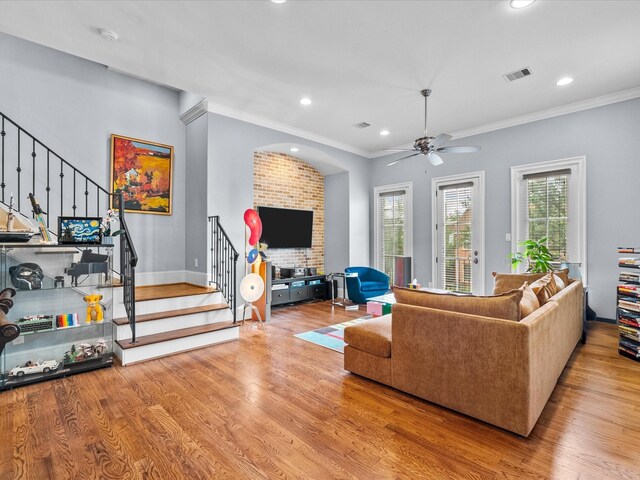 1616 Rosewood St, Houston, TX 77004 - living room featuring stairs, ornamental molding, wood finished floors, ceiling fan, and recessed lighting