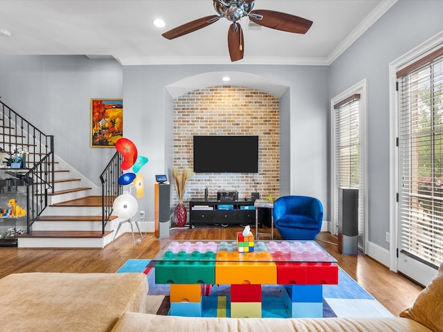 1616 Rosewood St, Houston, TX 77004 - living area with wood finished floors, ceiling fan, stairway, recessed lighting, and ornamental molding