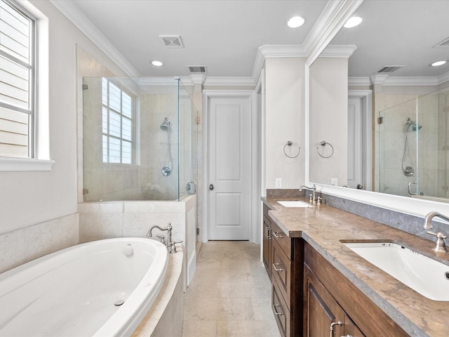 1616 Rosewood St, Houston, TX 77004 - full bath with a shower stall, a bath, double vanity, ornamental molding, and recessed lighting