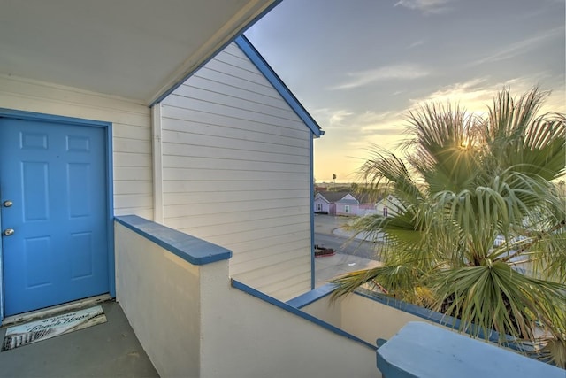 14434 E Cabana St Unit 319, Corpus Christi, TX 78418 - exterior entry at dusk with a balcony
