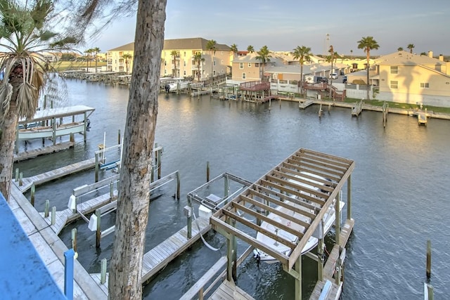 14434 E Cabana St Unit 319, Corpus Christi, TX 78418 - dock area featuring a water view, boat lift, and a residential view