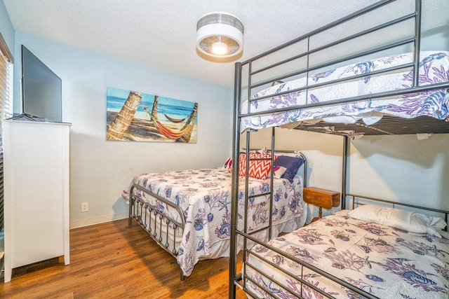 14434 E Cabana St Unit 319, Corpus Christi, TX 78418 - bedroom featuring wood finished floors and baseboards