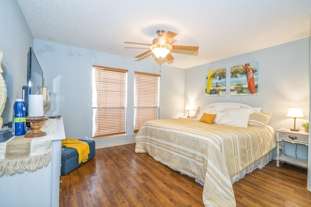 14434 E Cabana St Unit 319, Corpus Christi, TX 78418 - bedroom with wood finished floors, a textured ceiling, and ceiling fan